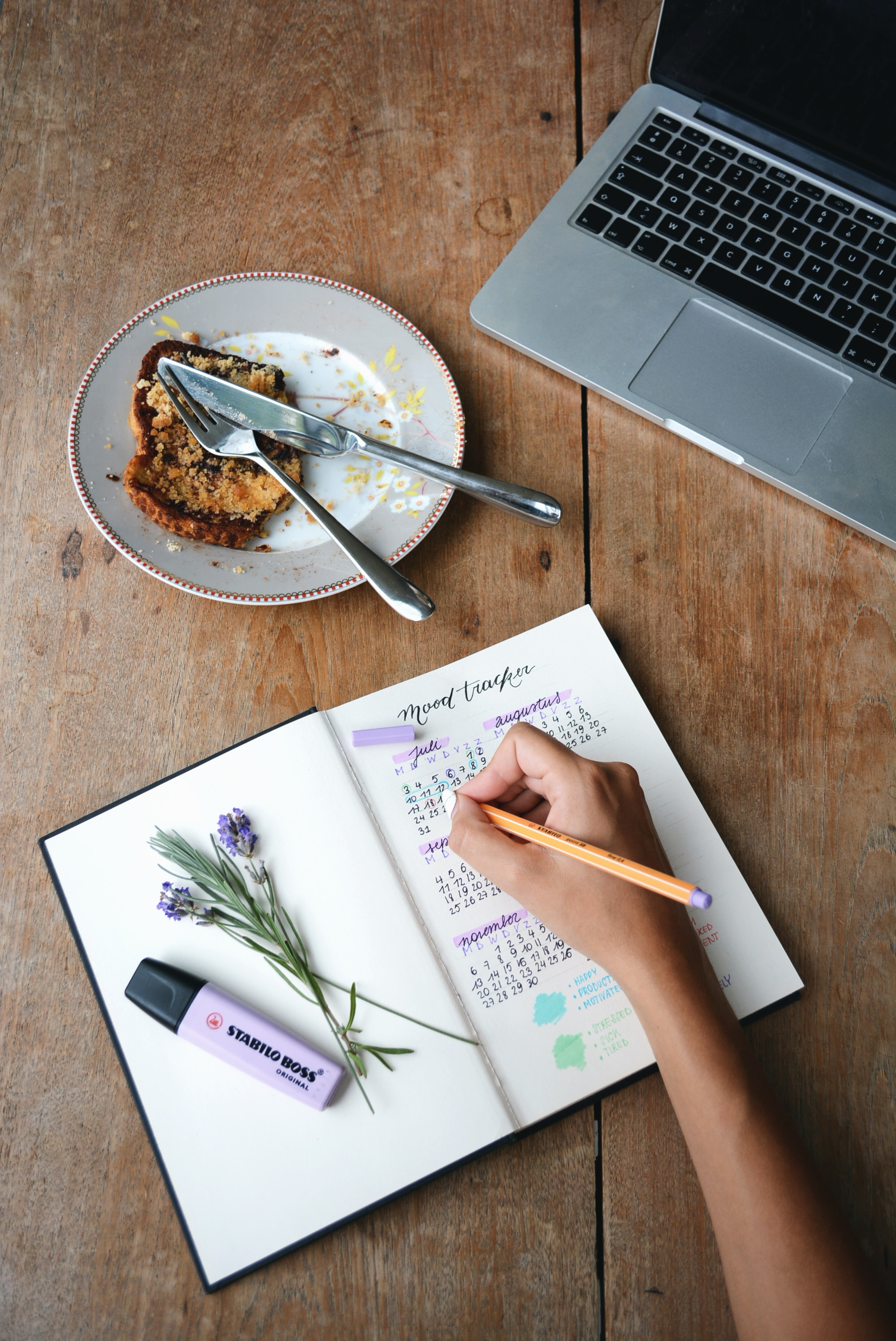 Person writing in journal